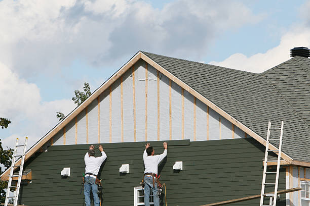 Professional Siding Installation technician working in Sherwood, OH